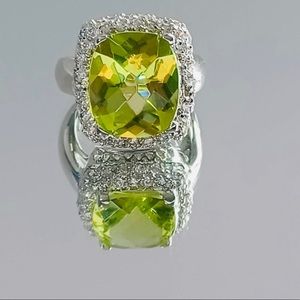 Beautiful Green Stone Ring lined with Silver clear stones